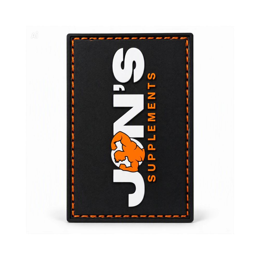 Black rubber Velcro patch with orange-stitched border and white-and-orange logo